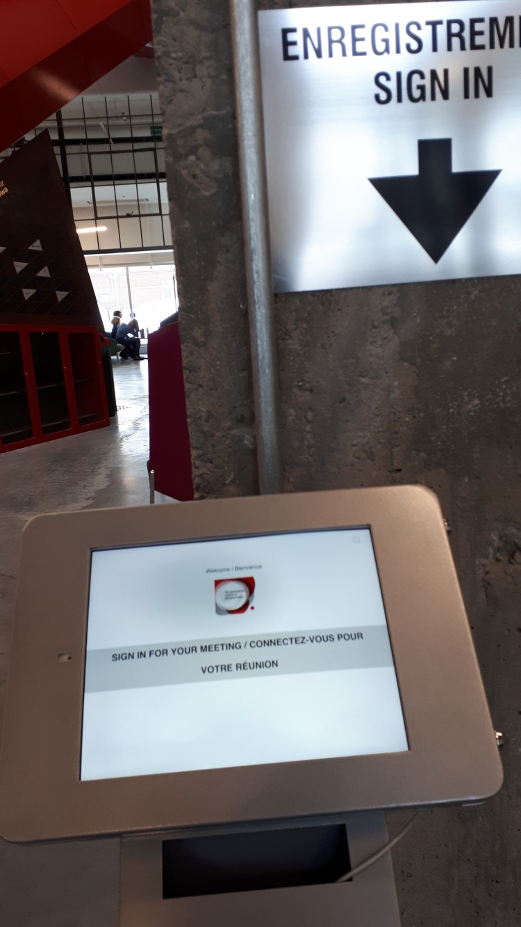 Sign in at Reception at Invest Ottawa Babies Business Breakfast Amy Maureen Lynch