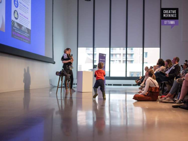 Amy Lynch presenting at CreativeMorning Ottawa with her kids