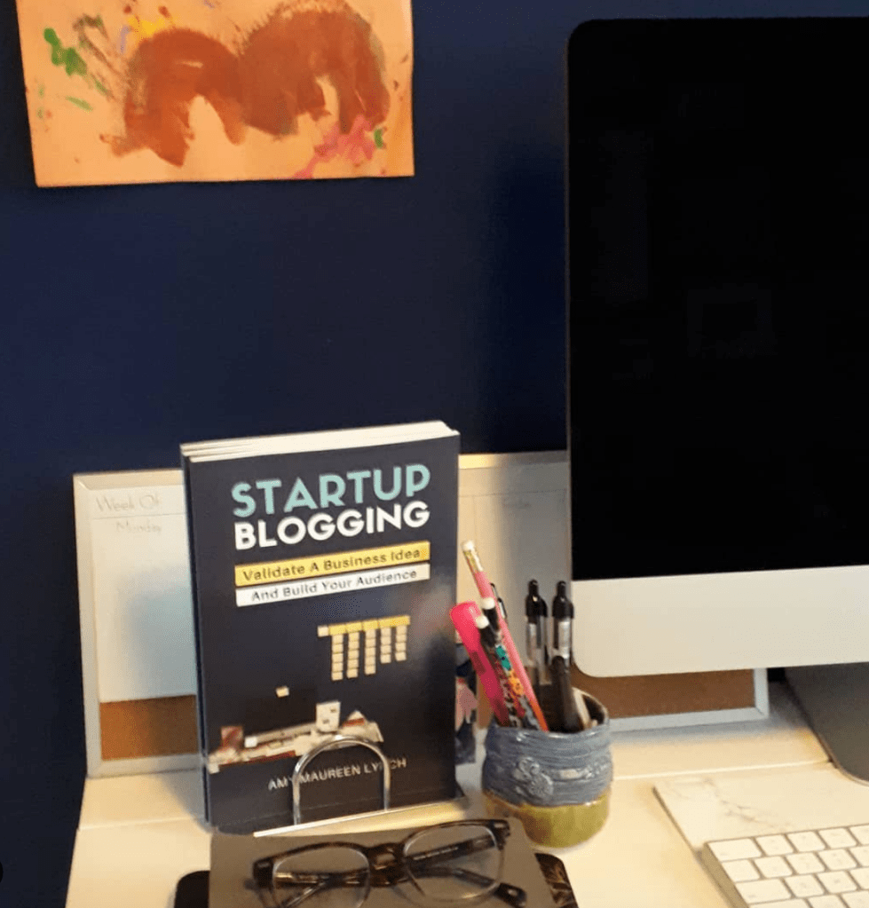 Amy Maureen Lynch first book released in April 2020, Startup Blogging: Validate A Business Idea and Build Your Audience, on display in the Author's home office