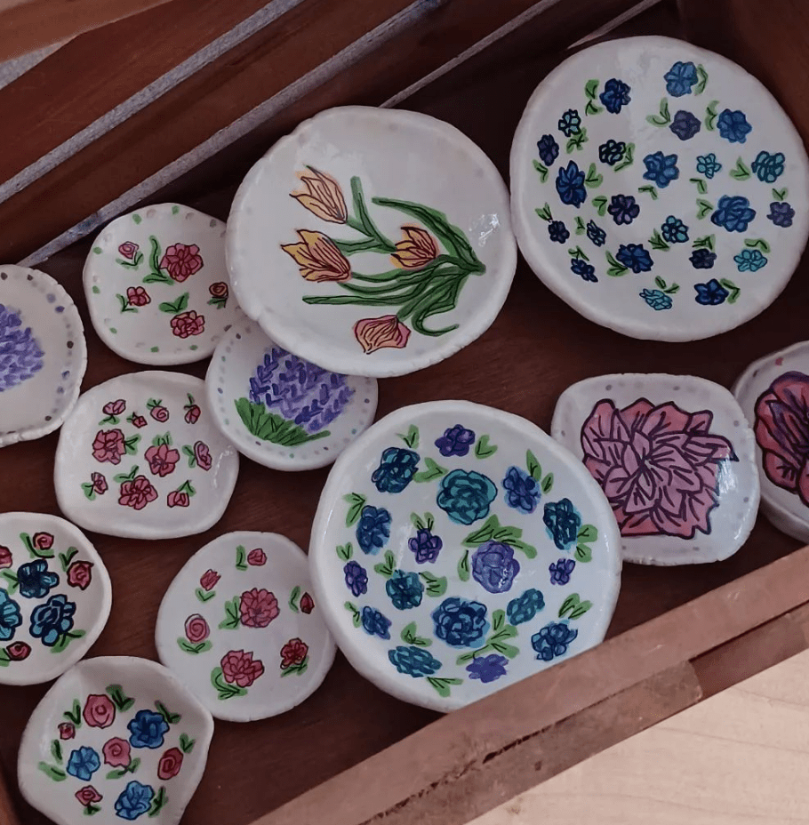 Clay pinch pots handpainted with watercolour and ink drawings of florals roses carnations tulips lavender plants  by Amy Lynch, Notes From Another Land.